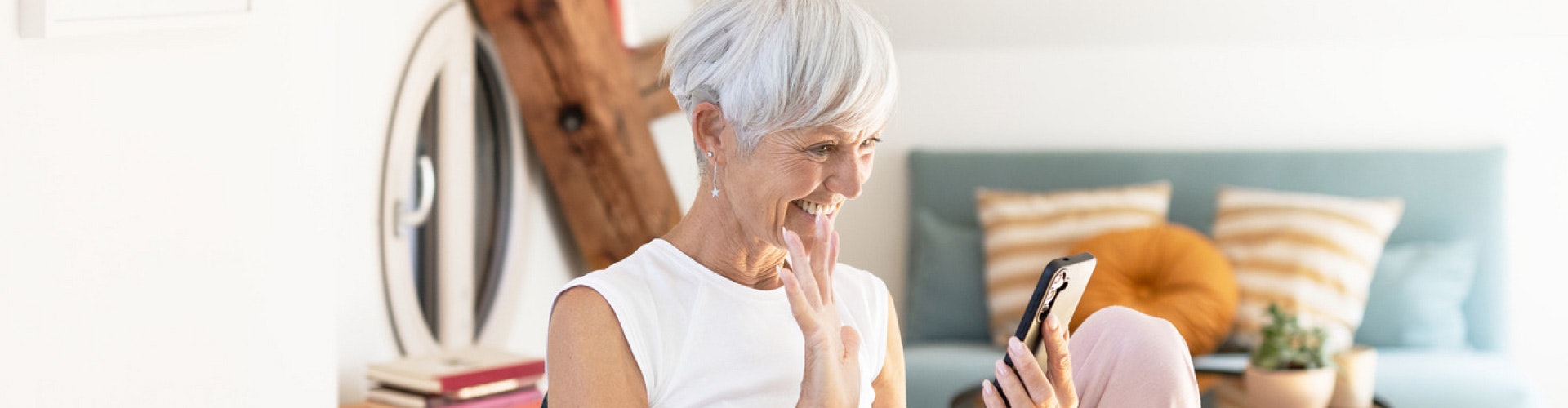 Implanted women looking at phone